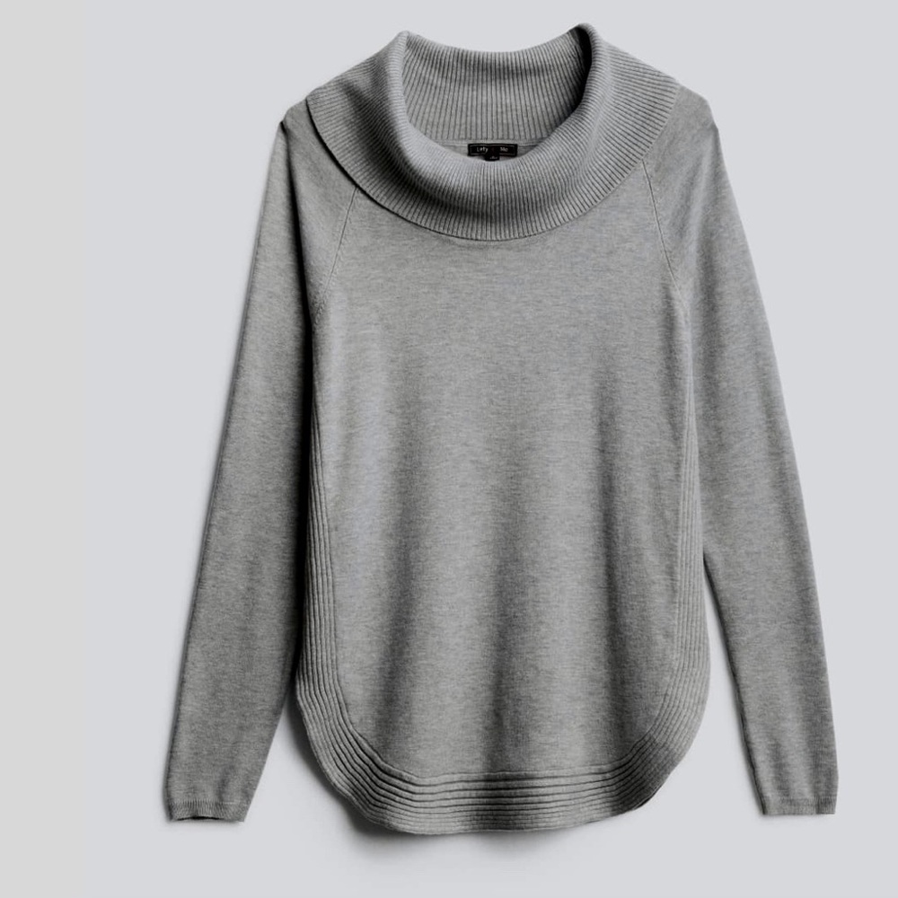 Long sleeve more on the light weight side turtle neck. Brand lety & me